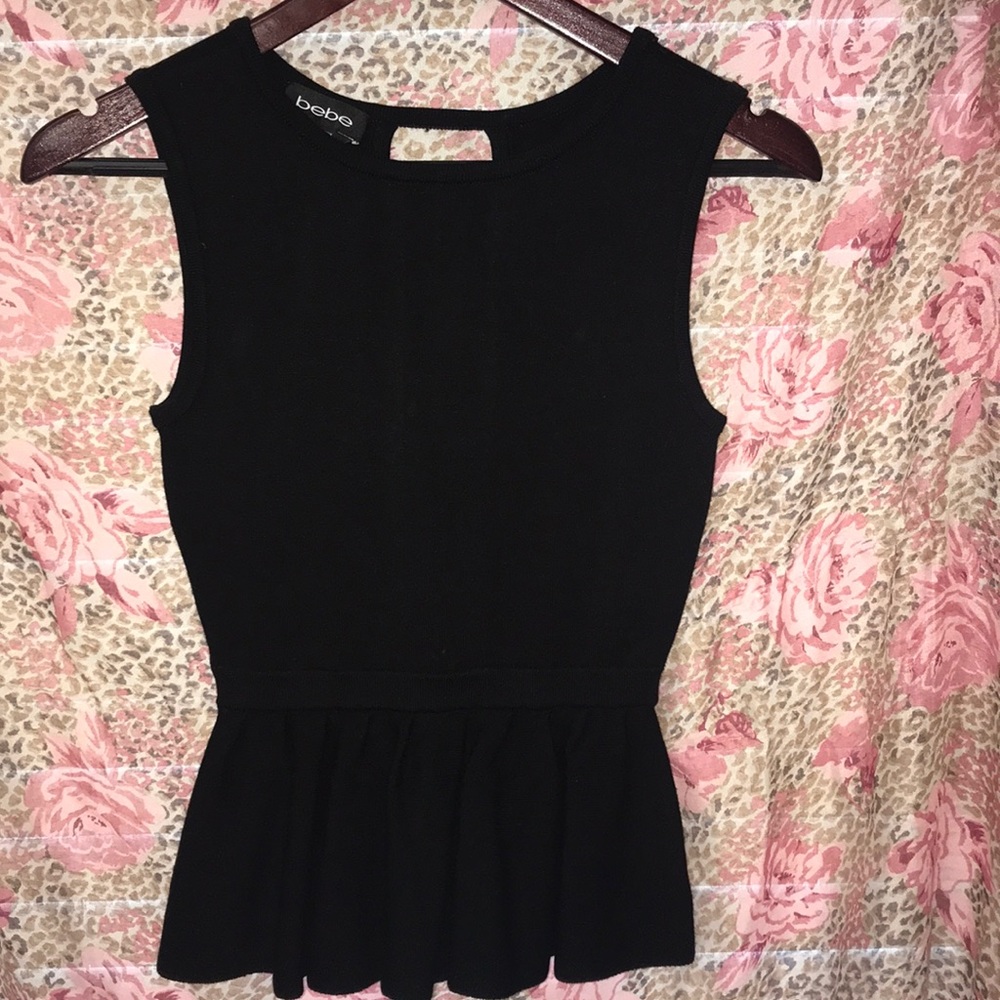 Bebe peplum black blouse. Size xsmall.